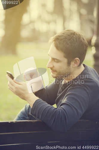 Image of Man with smart phone