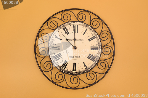 Image of Vintage style round clock on the wall