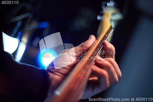 Image of Guitarist playing live