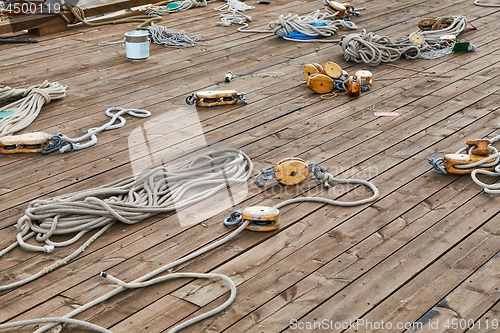 Image of Sailing boat roaps on a deck