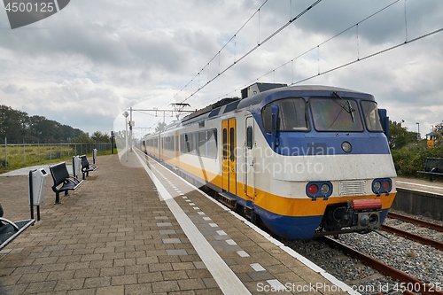 Image of Railway station with passanger train