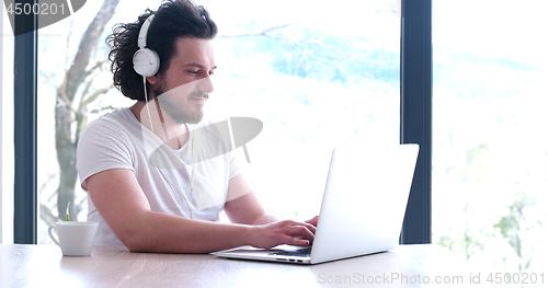 Image of man drinking coffee enjoying relaxing lifestyle