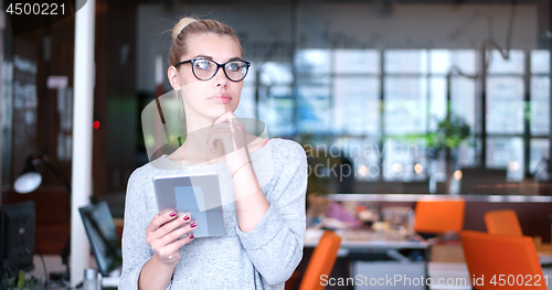 Image of Businesswoman using tablet