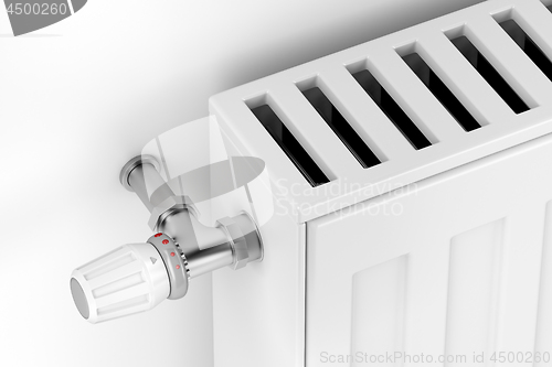 Image of Heating radiator with thermostat valve
