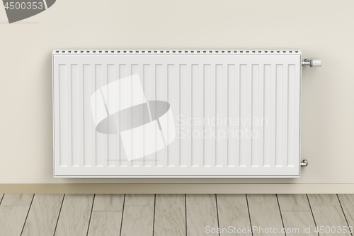 Image of White heating radiator in the room