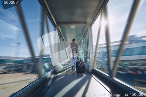 Image of Man hurrying at airport