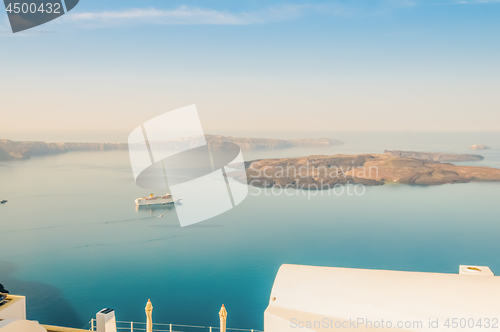 Image of The beautiful white village Fira and vie to the Nea Kameni,