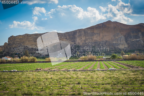 Image of Panoramic view to the caves in mountains in motion.