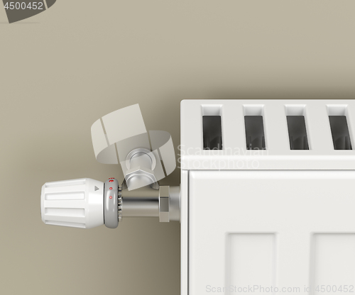 Image of Heating radiator with thermostat valve
