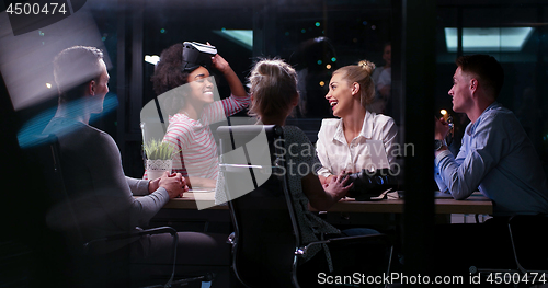 Image of Multiethnic Business team using virtual reality headset