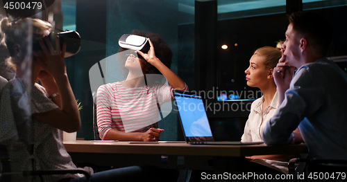 Image of Multiethnic Business team using virtual reality headset