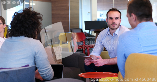 Image of Startup Business Team At A Meeting at modern office building