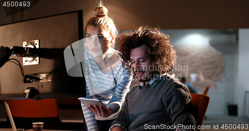 Image of young designers in the night office