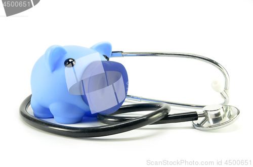 Image of Stethoscope and piggy bank