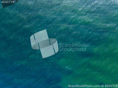 Image of Aerial top view water surface background. Bird eye sea surface p