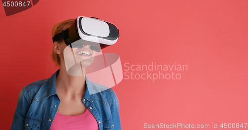 Image of young girl using VR headset glasses of virtual reality