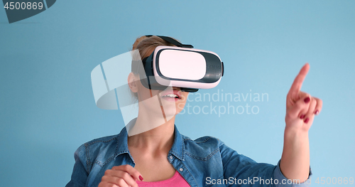 Image of woman using VR headset glasses of virtual reality