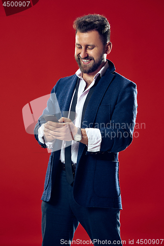 Image of Handsome businessman with mobile phone