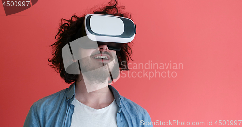 Image of young man using VR headset glasses of virtual reality