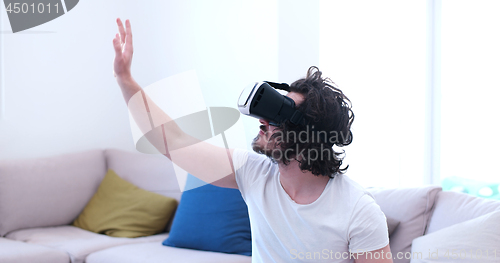 Image of man using VR-headset glasses of virtual reality