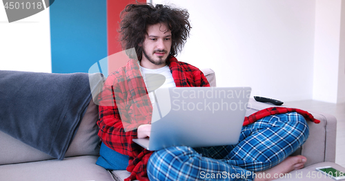 Image of man drinking coffee enjoying relaxing lifestyle