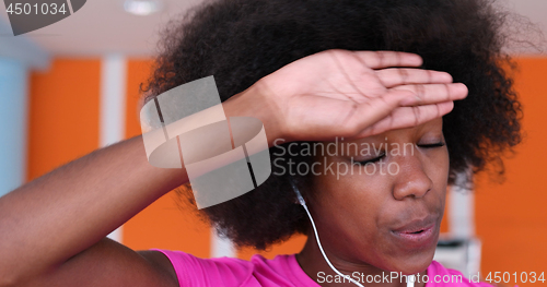 Image of portrait of young black woman in gym