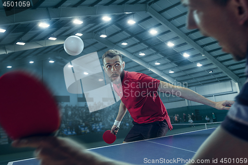 Image of The table tennis player serving