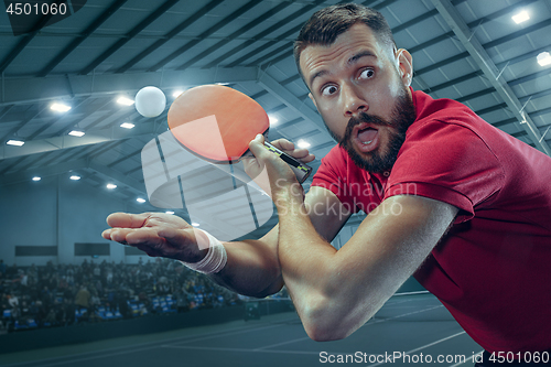 Image of The table tennis player serving