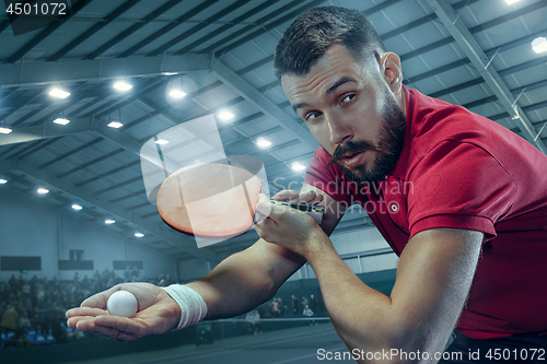 Image of The table tennis player serving