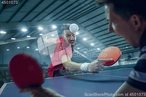 Image of The table tennis player serving