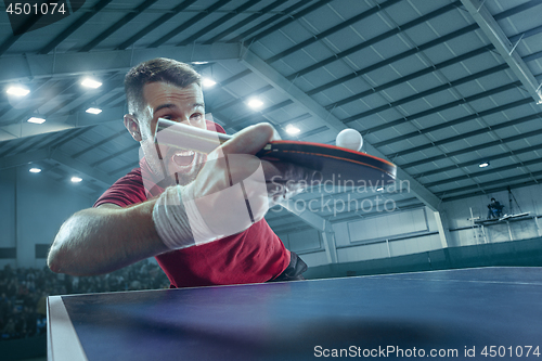 Image of The table tennis player serving