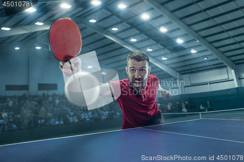 Image of The table tennis player serving