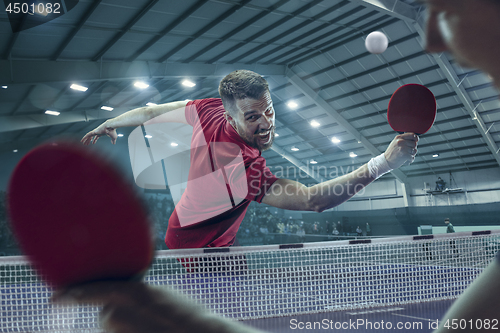 Image of The table tennis player serving