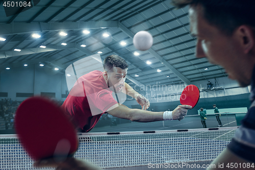 Image of The table tennis player serving