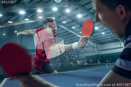 Image of The table tennis player serving