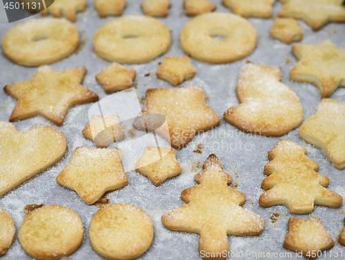 Image of traditional sweet Christmas cookies on a baking sheet