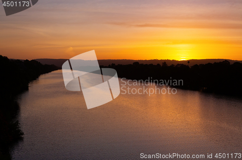 Image of Sun sets behind the Blue Mountains, view along Nepean River