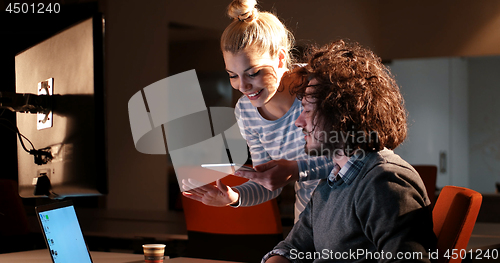 Image of young designers in the night office