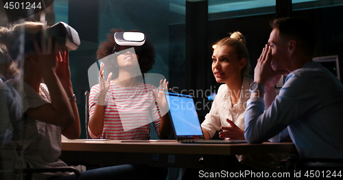 Image of Multiethnic Business team using virtual reality headset