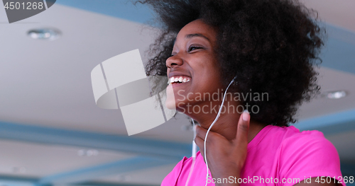 Image of portrait of young black woman in gym