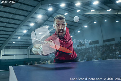 Image of The table tennis player serving