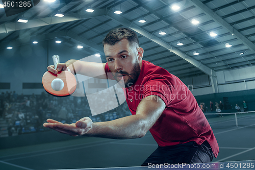 Image of The table tennis player serving