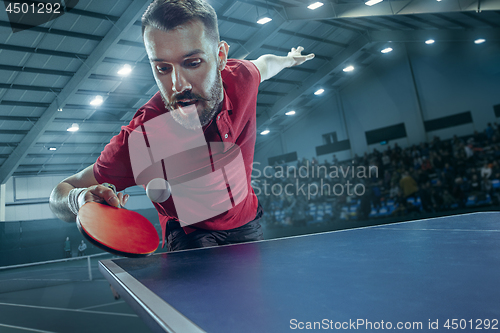 Image of The table tennis player serving