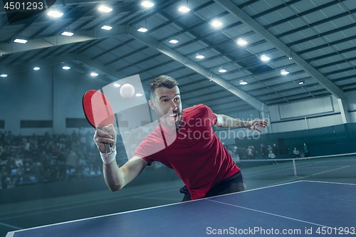 Image of The table tennis player serving