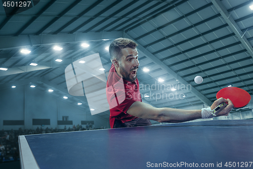 Image of The table tennis player serving