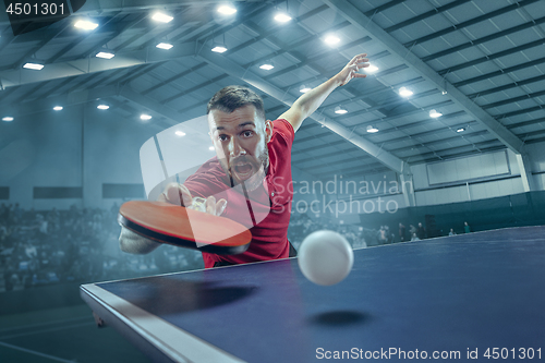 Image of The table tennis player serving