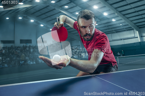 Image of The table tennis player serving