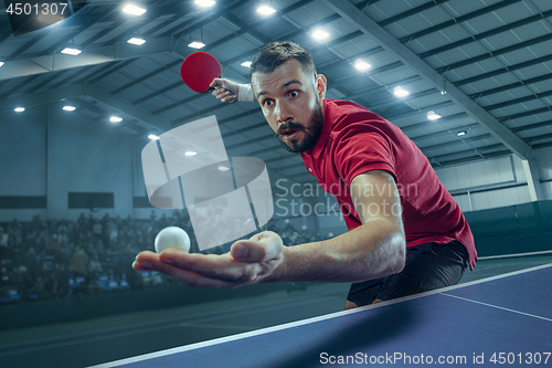 Image of The table tennis player serving