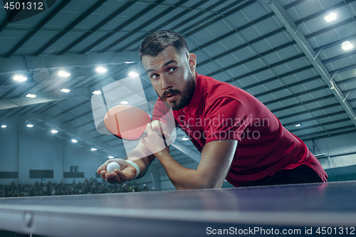 Image of The table tennis player serving