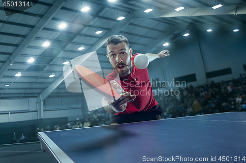 Image of The table tennis player serving